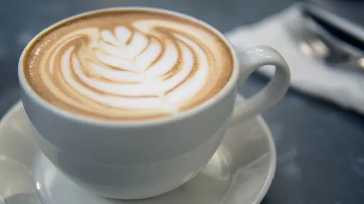 Illustrative photo of a coffee and café table, not of Cafe Scooteria