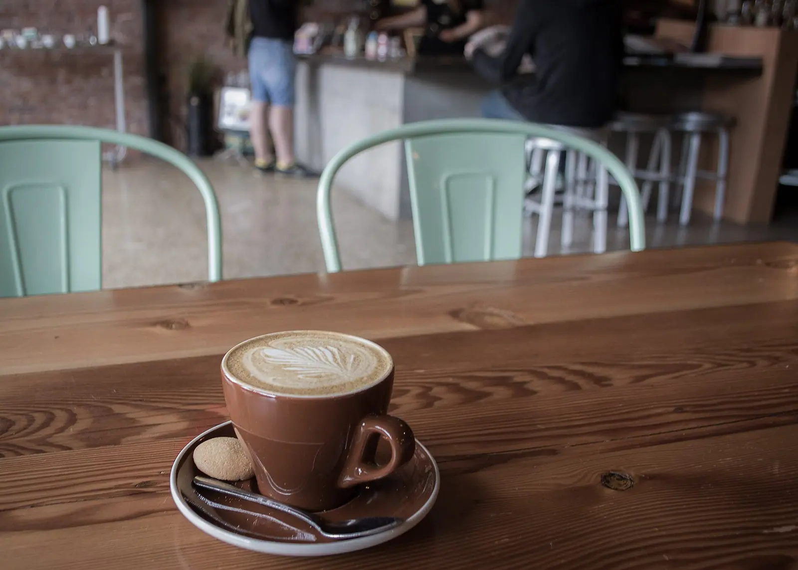 Illustrative photo of a coffee and café table, not of Sweet Scoops